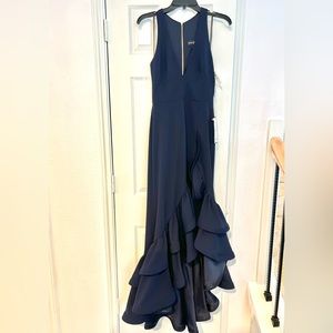 Brand new, never worn dress Size 4, color blue